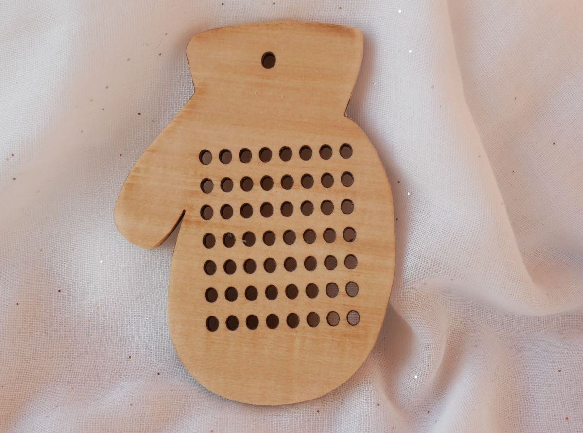 Borduren op hout: kerstdecoratie mof om zelf te borduren 