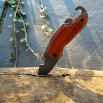 Vouwzakmes, houten handvat met gravure